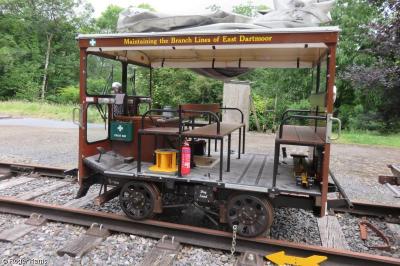 image showing a large yellow on-track machine